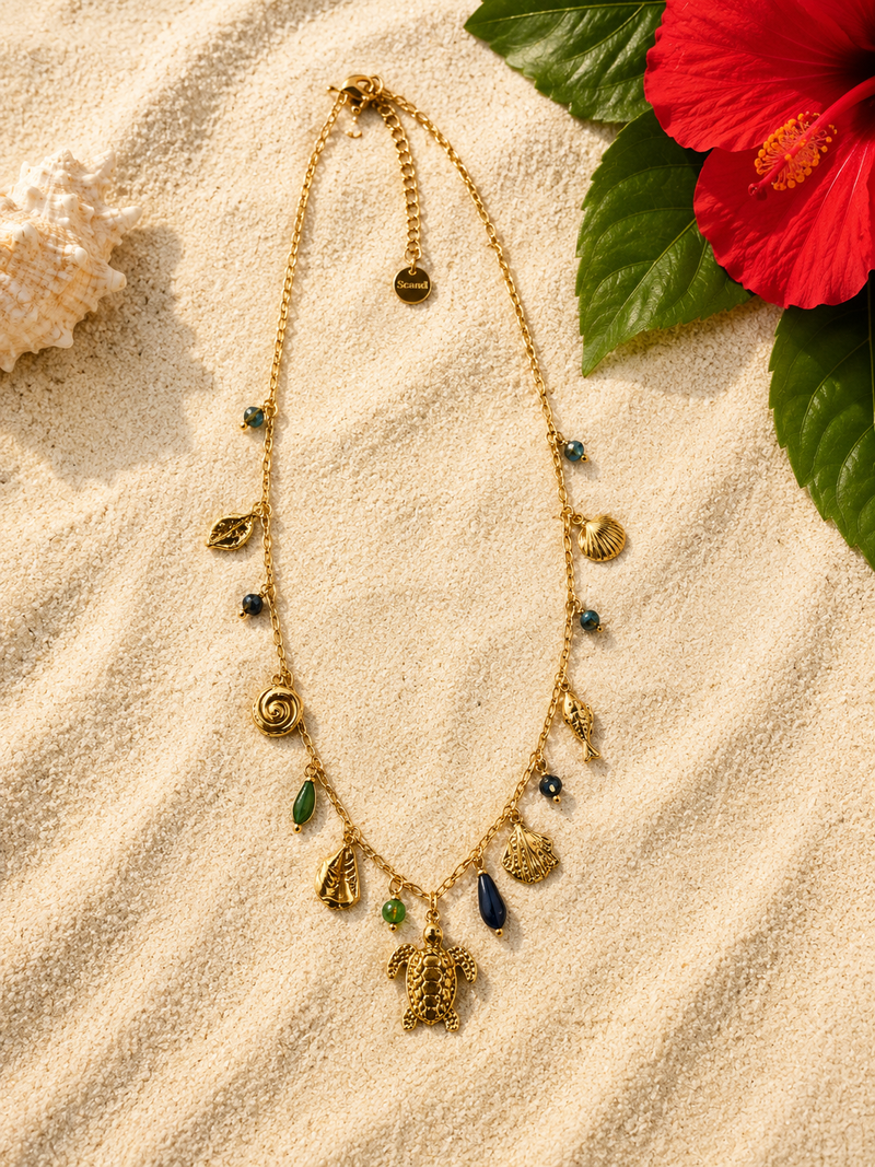 Collier multiple breloques tortue coquillage perle et poisson