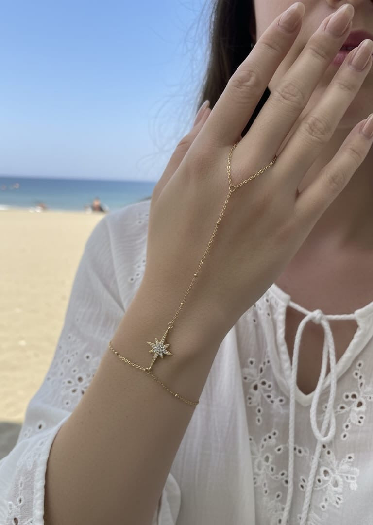 Chaîne de main étoile longue strass