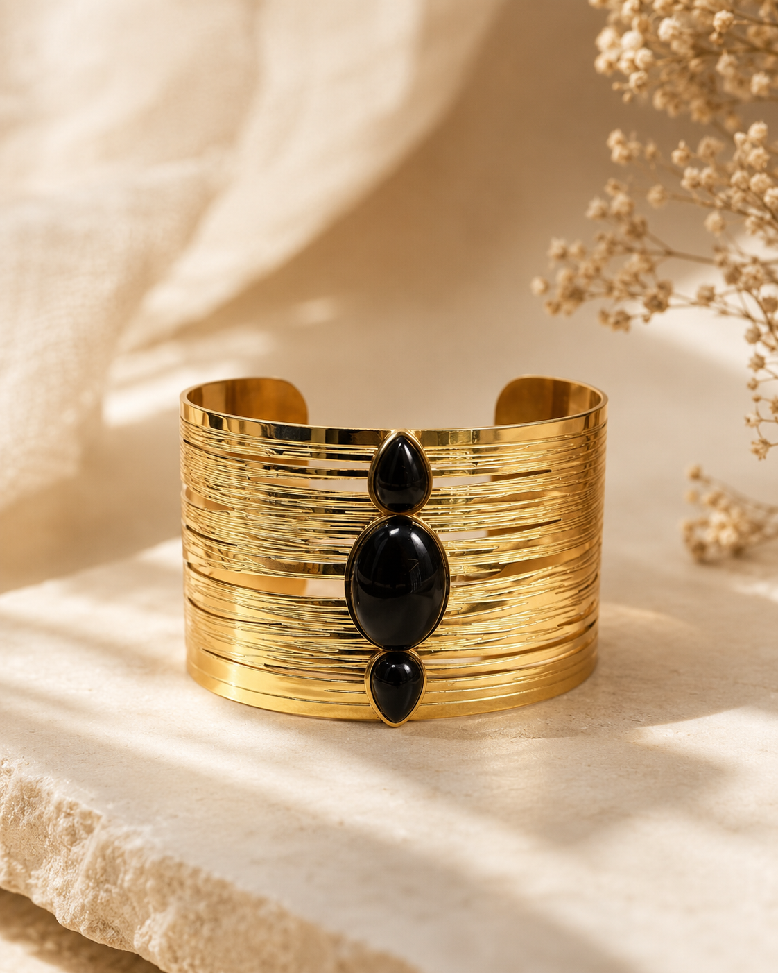 Manchette triple pierres verticales noir